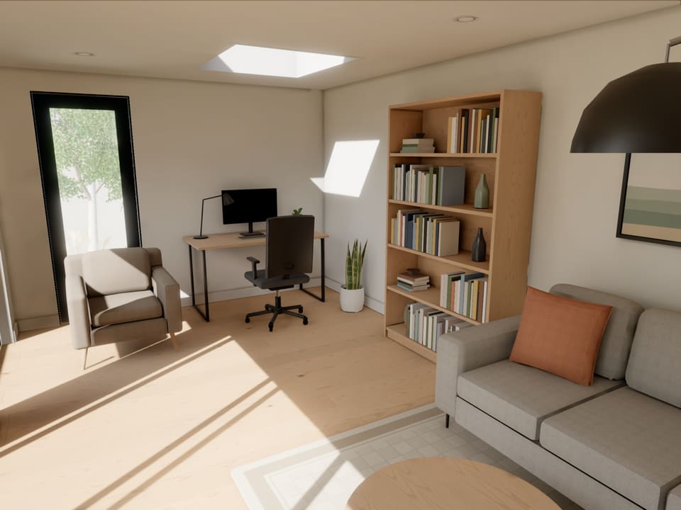 Inside the garden room sample, finished and furnished: an office and lounge with a desk, a bookcase and a sofa, the sun coming in through the glass doors.